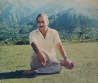 Gurudev sitting in a Garden