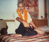 Gurudev sitting in His room